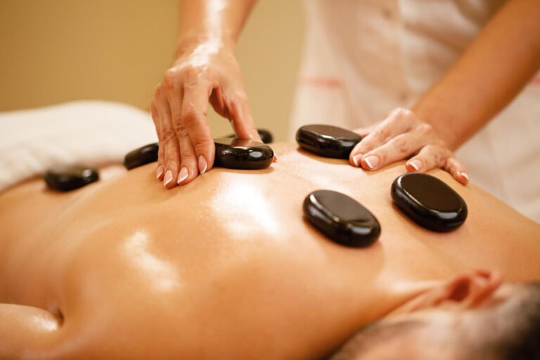 Abhyanga Hot Stone Ayurvedic Massage therapy with herbal oils in Canada